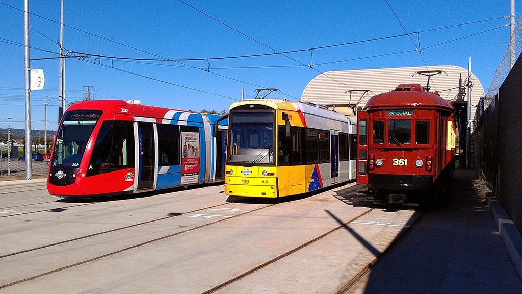 A citadis, Flexity, and H-class tram in the depot yard.